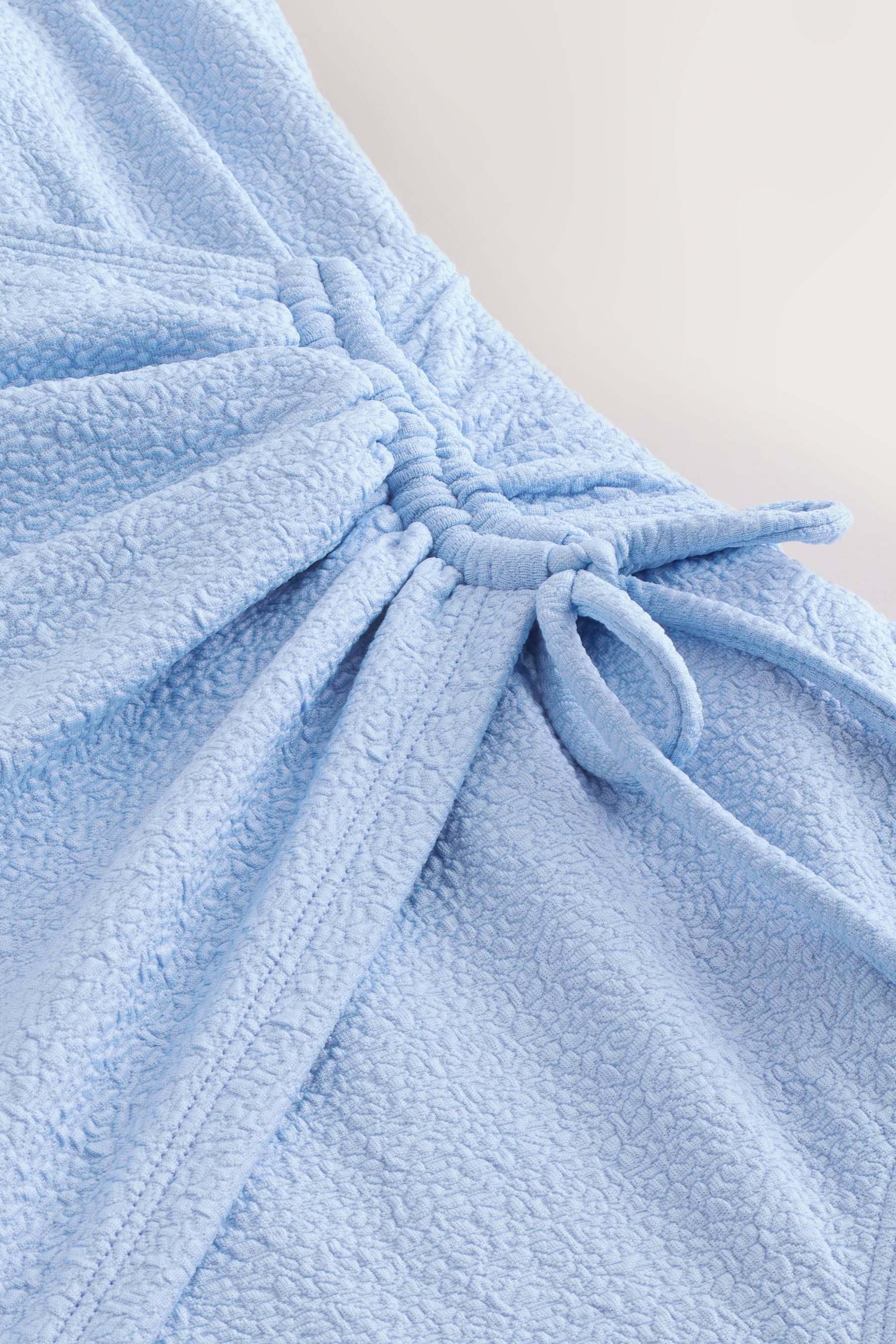 Next Badeanzug Bauchformender Badeanzug mit seitlicher Raffung (1-St) günstig online kaufen