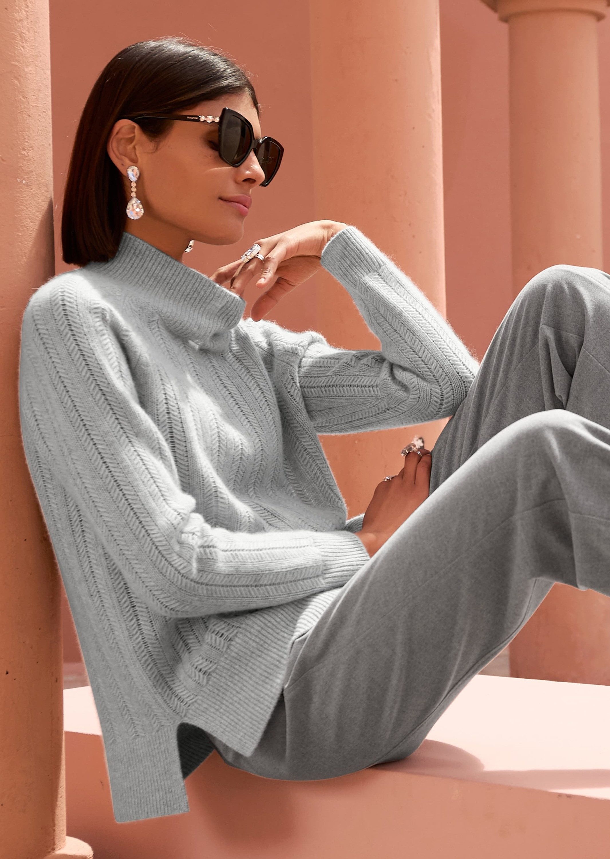 Strickpullover Eleganter Strickpullover mit Zopf- und Ajour-Muster