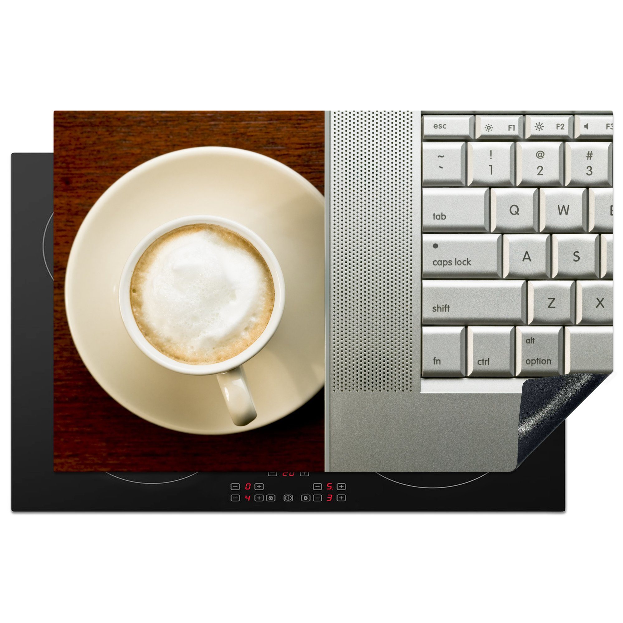 MuchoWow Herdblende-/Abdeckplatte Eine Tasse Cappuccino steht neben einem Laptop, Vinyl, (1 tlg), 81x52 cm, Induktionskochfeld Schutz für die küche, Ceranfeldabdeckung