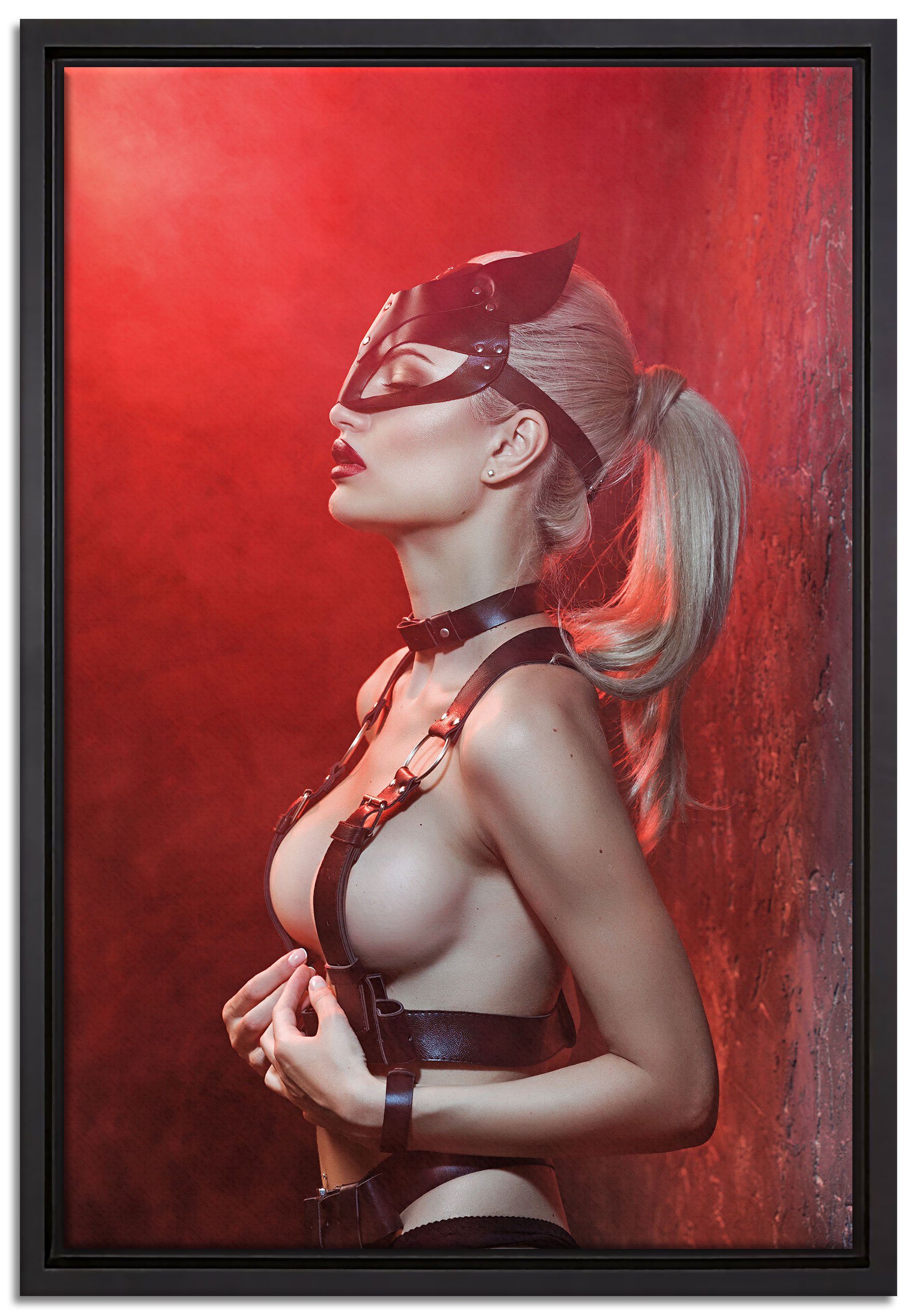 Pixxprint Leinwandbild Sexy Blondine in Leder im Rotlicht, Wanddekoration (1 St), Leinwandbild fertig bespannt, in einem Schattenfugen-Bilderrahmen gefasst, inkl. Zackenaufhänger | Leinwandbilder