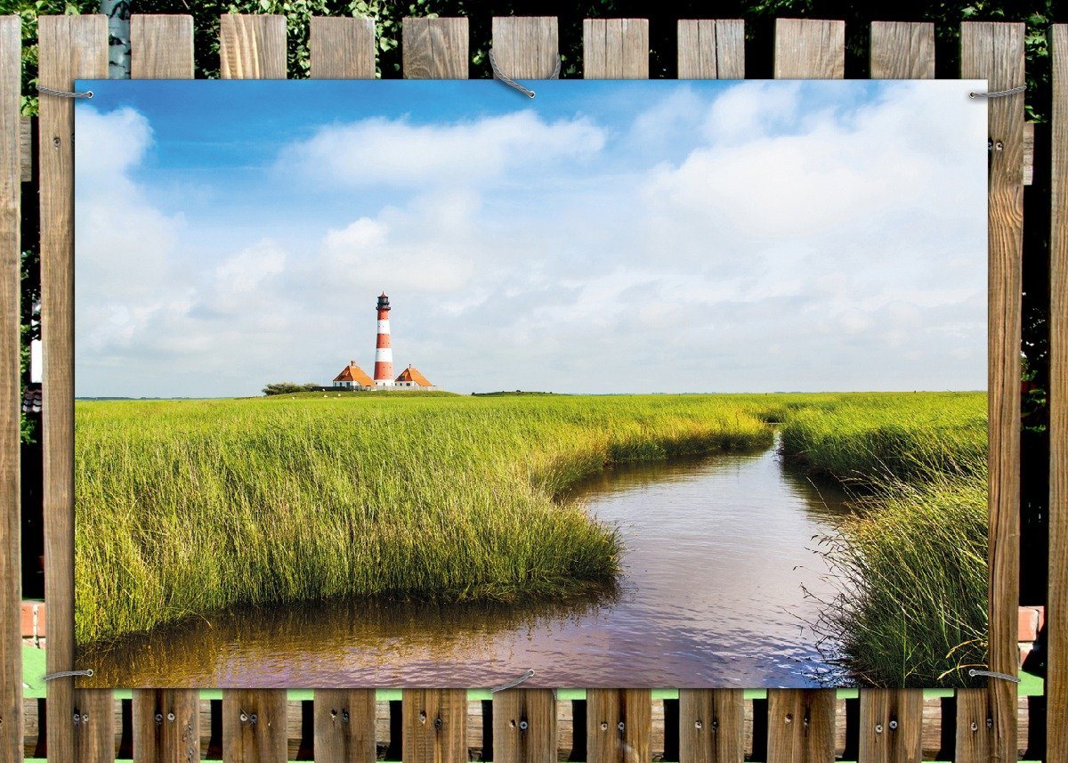 Thumbnail - Wallario Sichtschutzzaunmatten Kleiner Bach durch Schilf auf dem Weg zum Leuchtturm