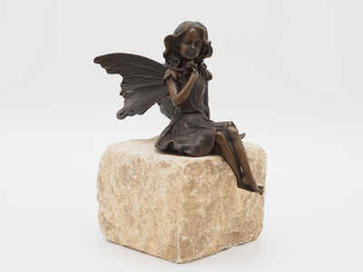 Bronzeskulpturen Skulptur Bronzefigur sitzende Elfe mit Blume Fee