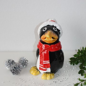 Tangoo Gartenfigur Tangoo Keramik-Pinguin mit rotem Schal und Mütze, (Stück)