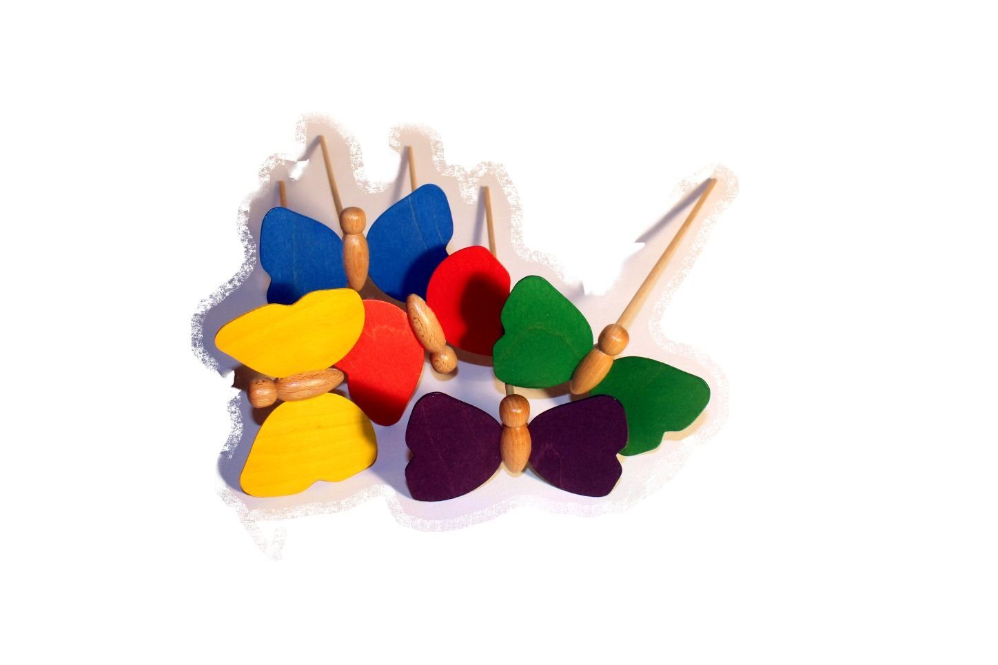 Erzgebirgische Holzspielwaren Ebert GmbH Sammelfigur Holzspielzeug Holzschmetterling mit Stecker lila Schmetterling 9 x 7cm, zur Dekoration von Pflanztöpfen oder Sträußen geeignet