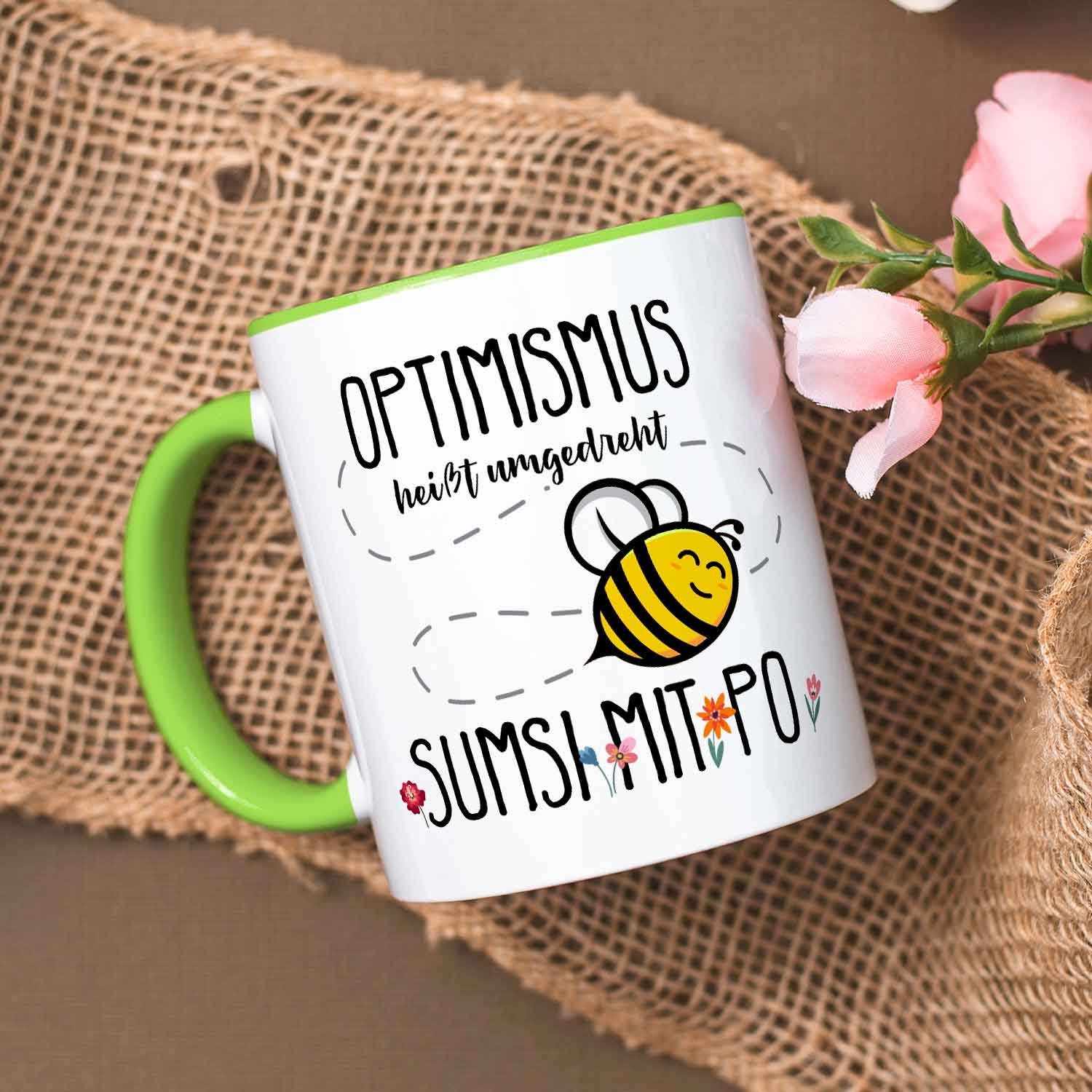GRAVURZEILE Tasse mit Spruch - Optimismus heißt umgedreht Sumsi mit Po - Geschenk -, Keramik
