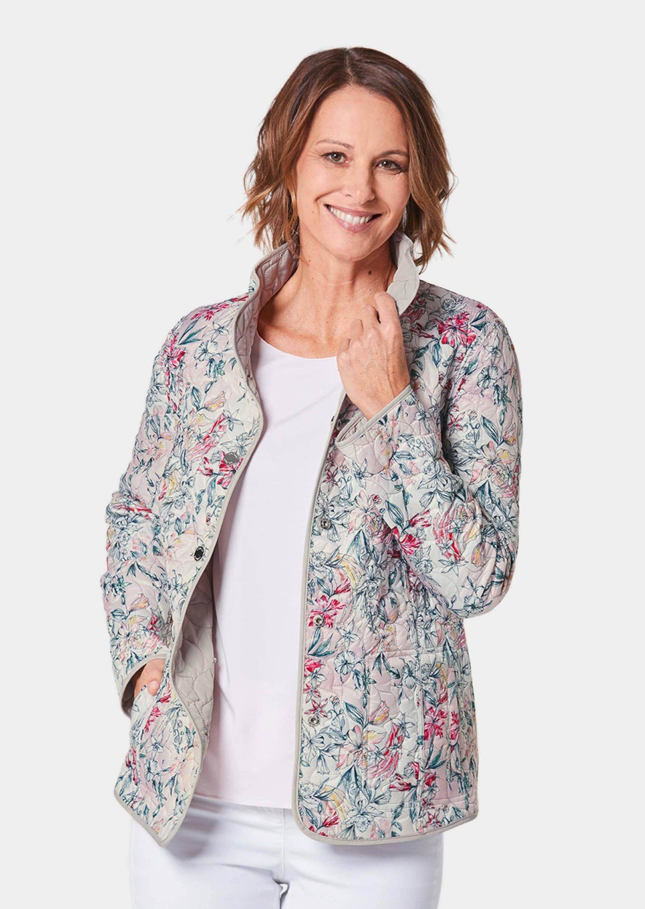 GOLDNER Steppjacke Stilvolle Steppjacke, florales Design Zweiseitige Printjacke mit Stehkragen, Knöpfen, Taschen und Langarm