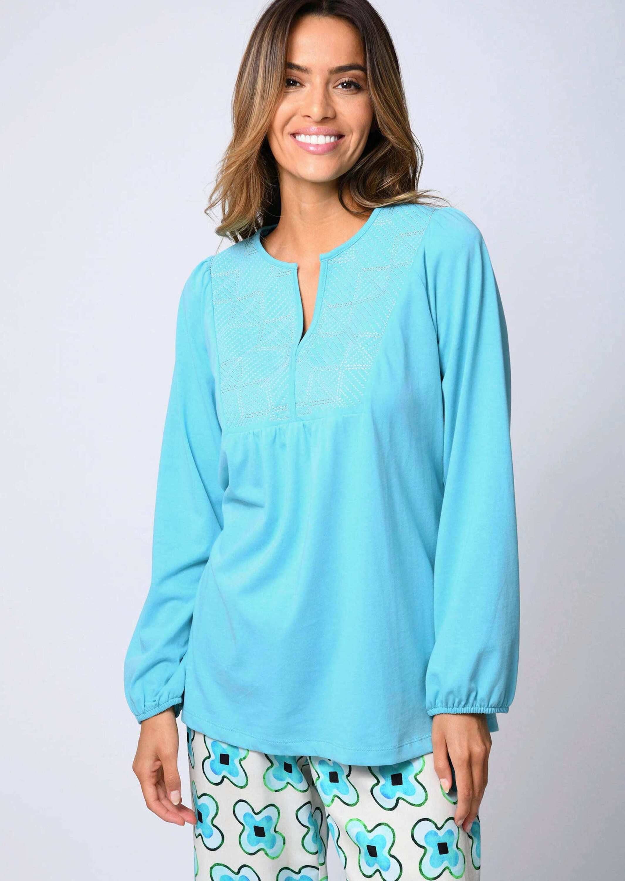 Tunika Bluse mit grafischer Stickerei