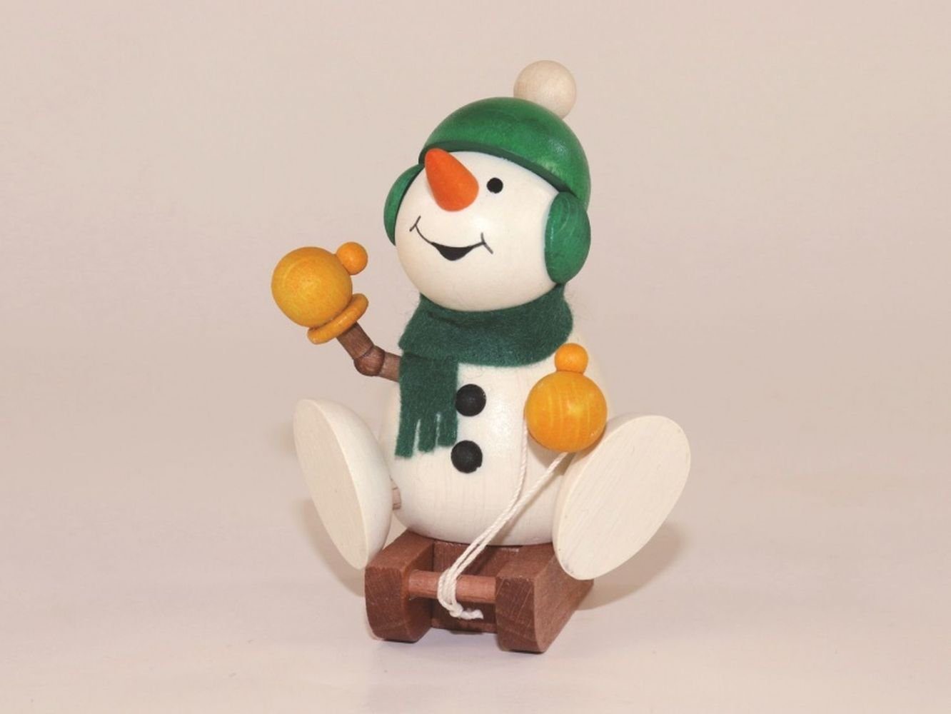 Ullrich Kunsthandwerk Schneemann Holzfigur Schneemann auf Schlitten Höhe=9cm NEU