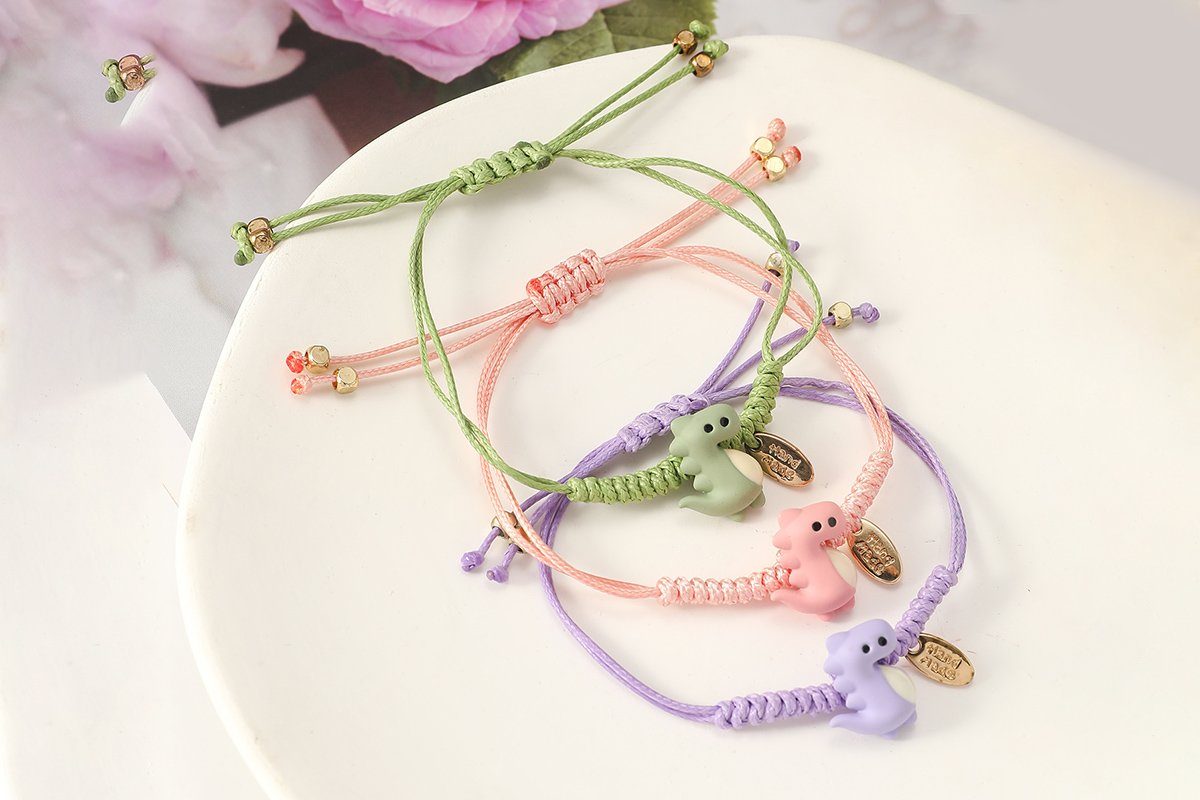 Eyecatcher Armkette Dinosaurier Armband Lila Rosa oder Grün One Size Stoff