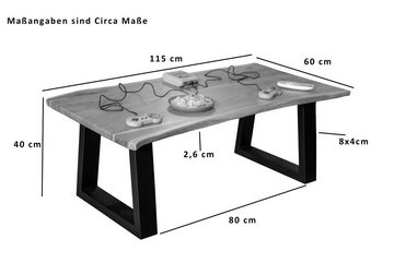 Junado® Couchtisch April, massives Akazienholz, Trapezgestell aus Metall in schwarz, Baumkante