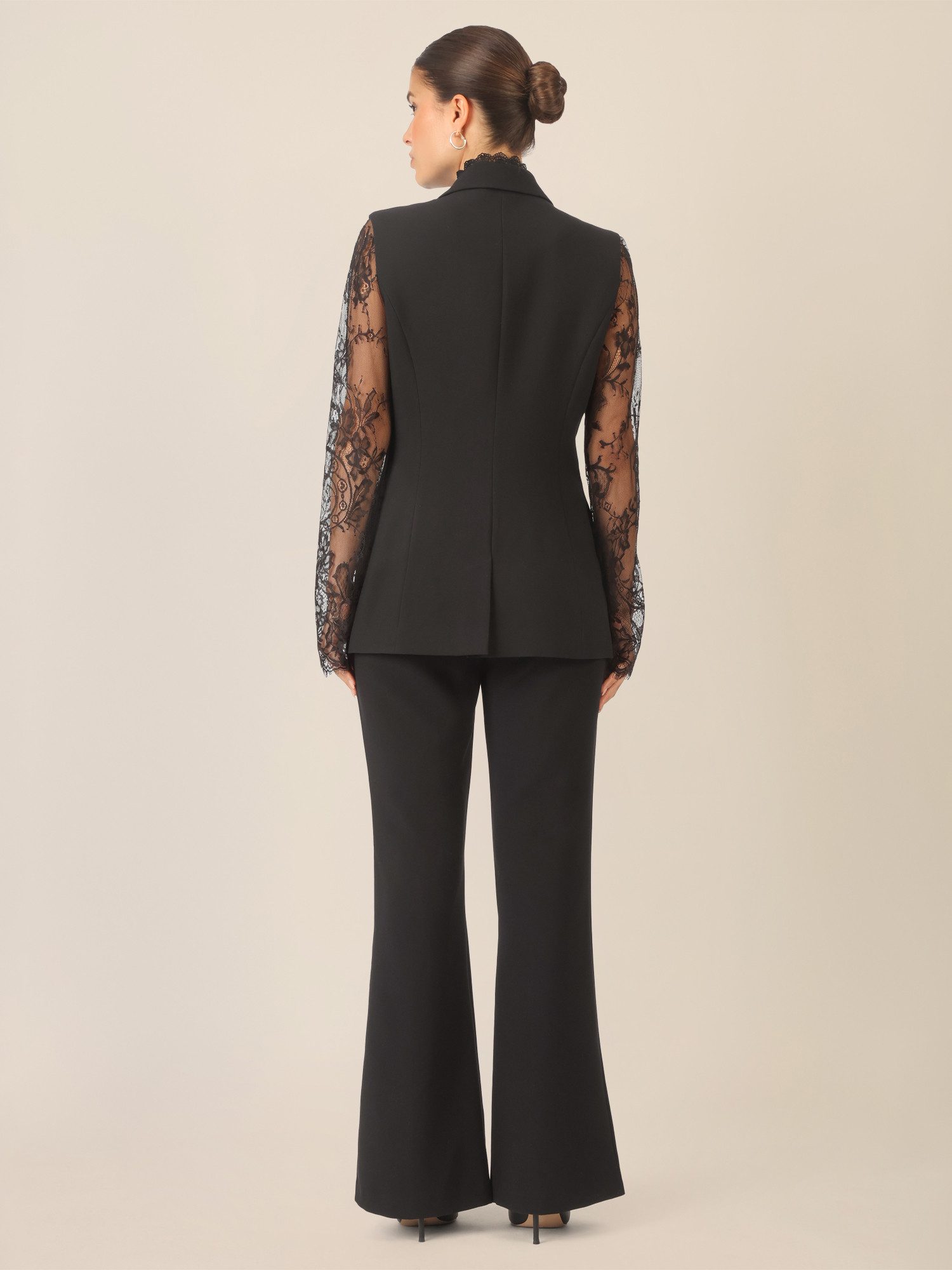 Apart pantsuit with lace details and decorative edge