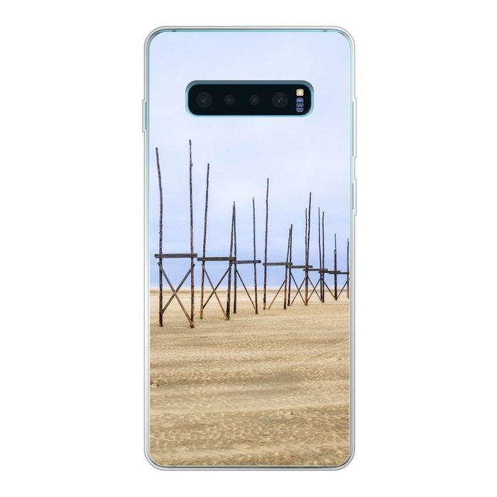 MuchoWow Handyhülle Pfähle am Strand von Vlieland Phone Case Handyhülle Samsung Galaxy S10 Lite Silikon Schutzhülle