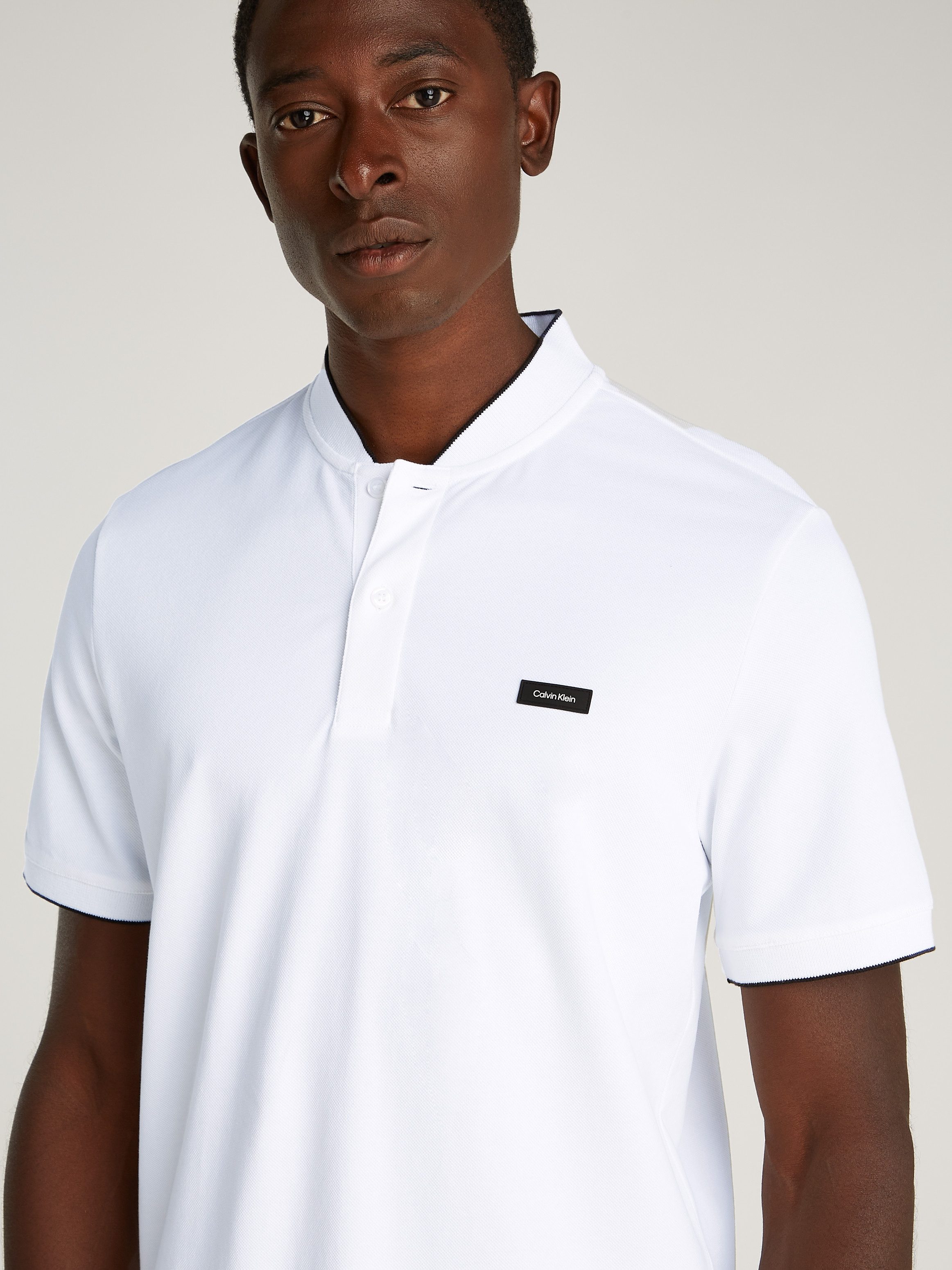 Calvin Klein Poloshirt STRETCH PIQUE STAND COLLAR POLO mit kontrastfarbenen günstig online kaufen