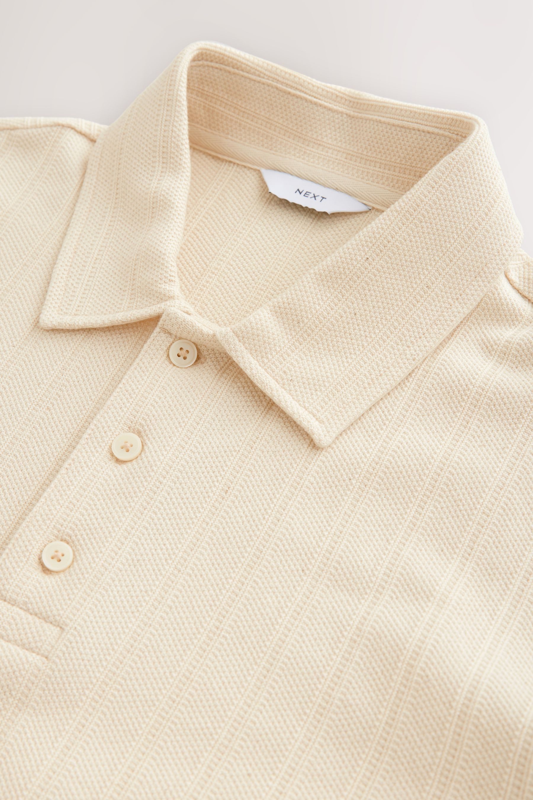Next Poloshirt Lässiges Poloshirt mit vertikaler günstig online kaufen