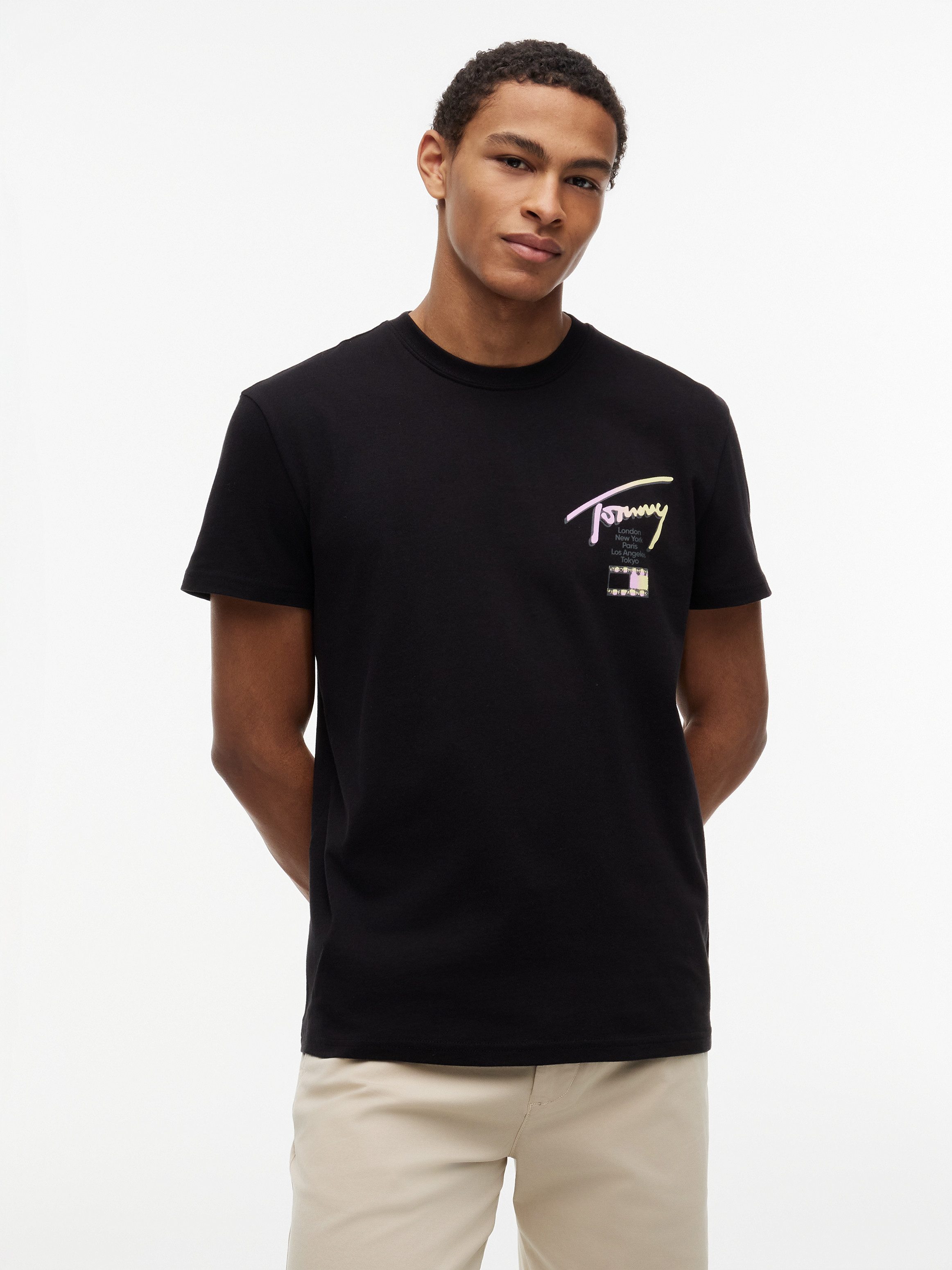 Tommy Jeans T-Shirt TJM REGULAR CITY SIGNATURE mit Tommy-Signatur-Logo auf dem Rücken
