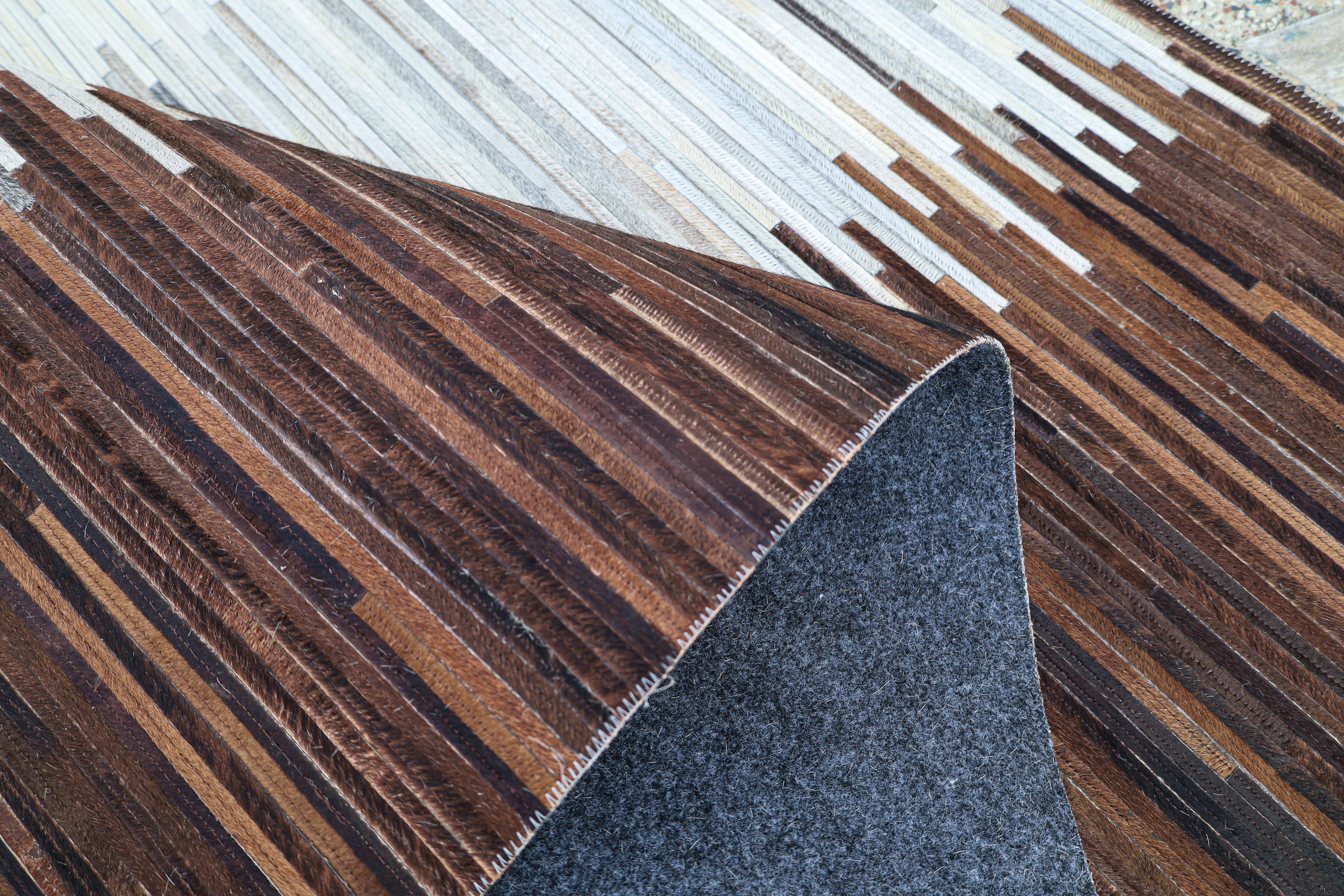 Myflair Möbel & Accessoires Fellteppich Urban Hide, echtes Rinderfell, rechteckig, Höhe: 10 mm, handgenäht, Naturprodukt, natürliche Struktur & Premium-Look
