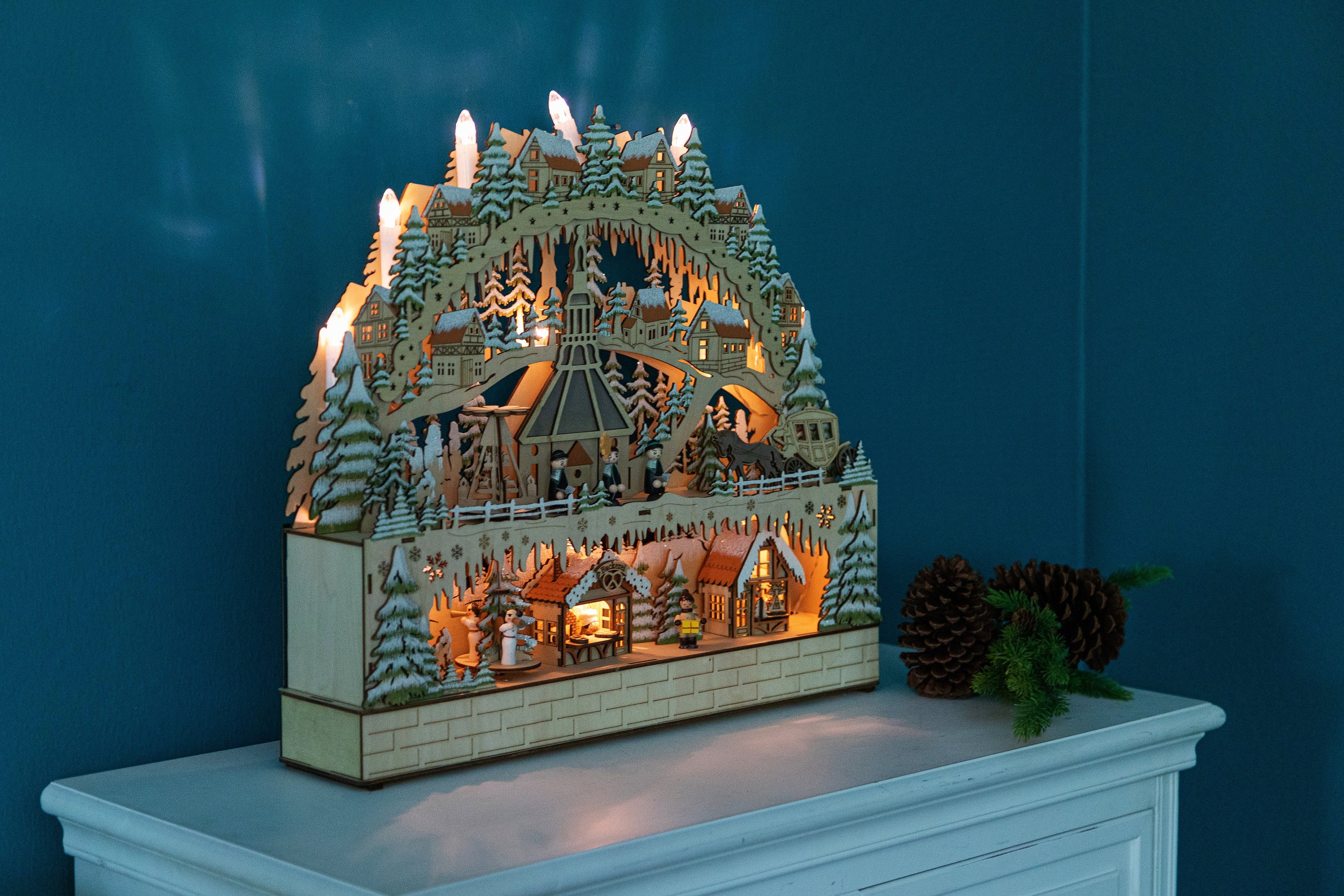 Home affaire LED Schwibbogen Deniz, mit Musikwerk (1-tlg), aus Holz mit LED Beleuchtung und bewegender Pyramide, Dorf im Gebirge