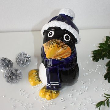 Tangoo Gartenfigur Tangoo Keramik-Pinguin mit blauem Schal und Mütze, (Stück)