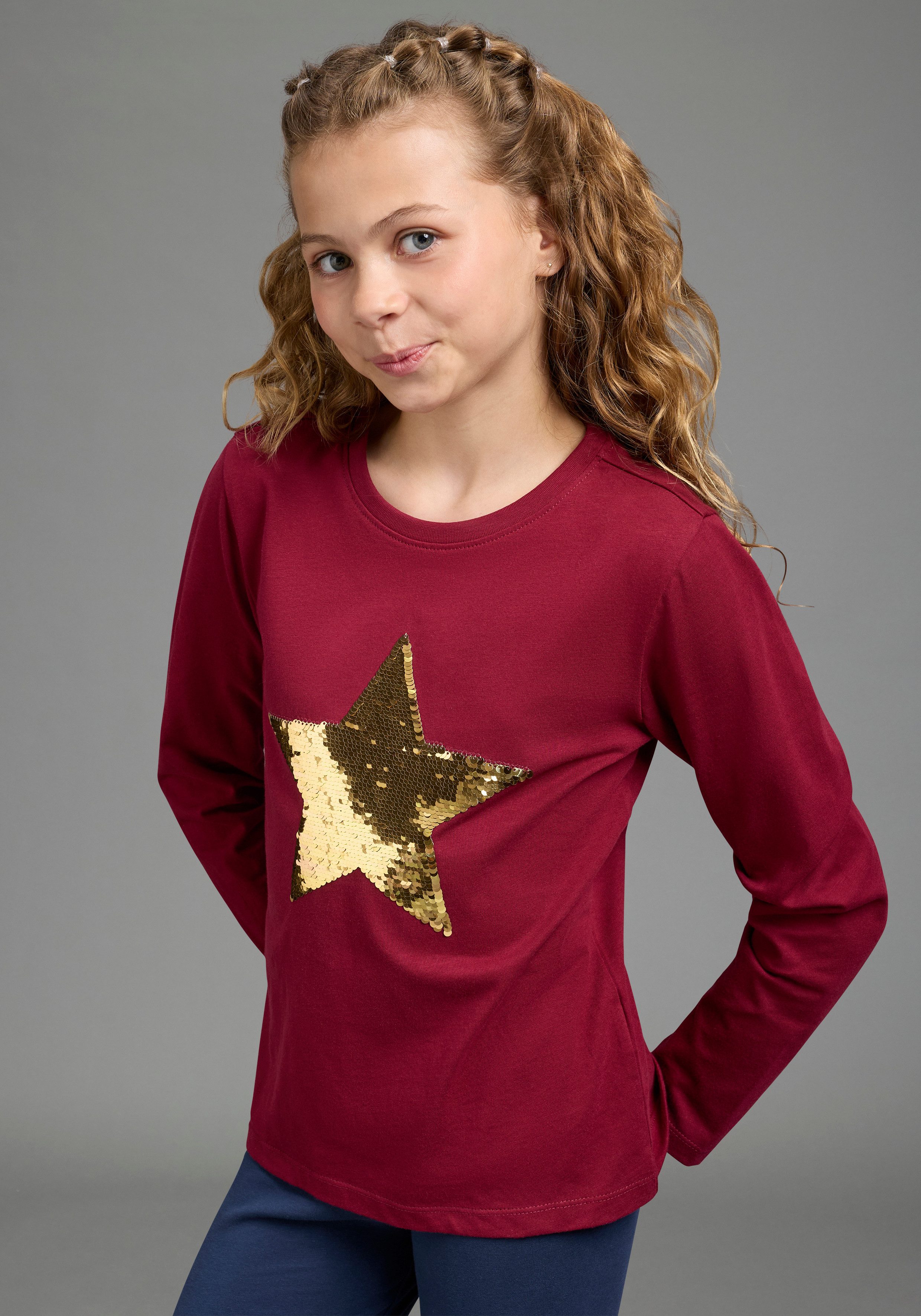 KIDSWORLD Langarmshirt mit STERN Applikation Langarm, taillierter Schnitt, mit glitzernden Pailletten
