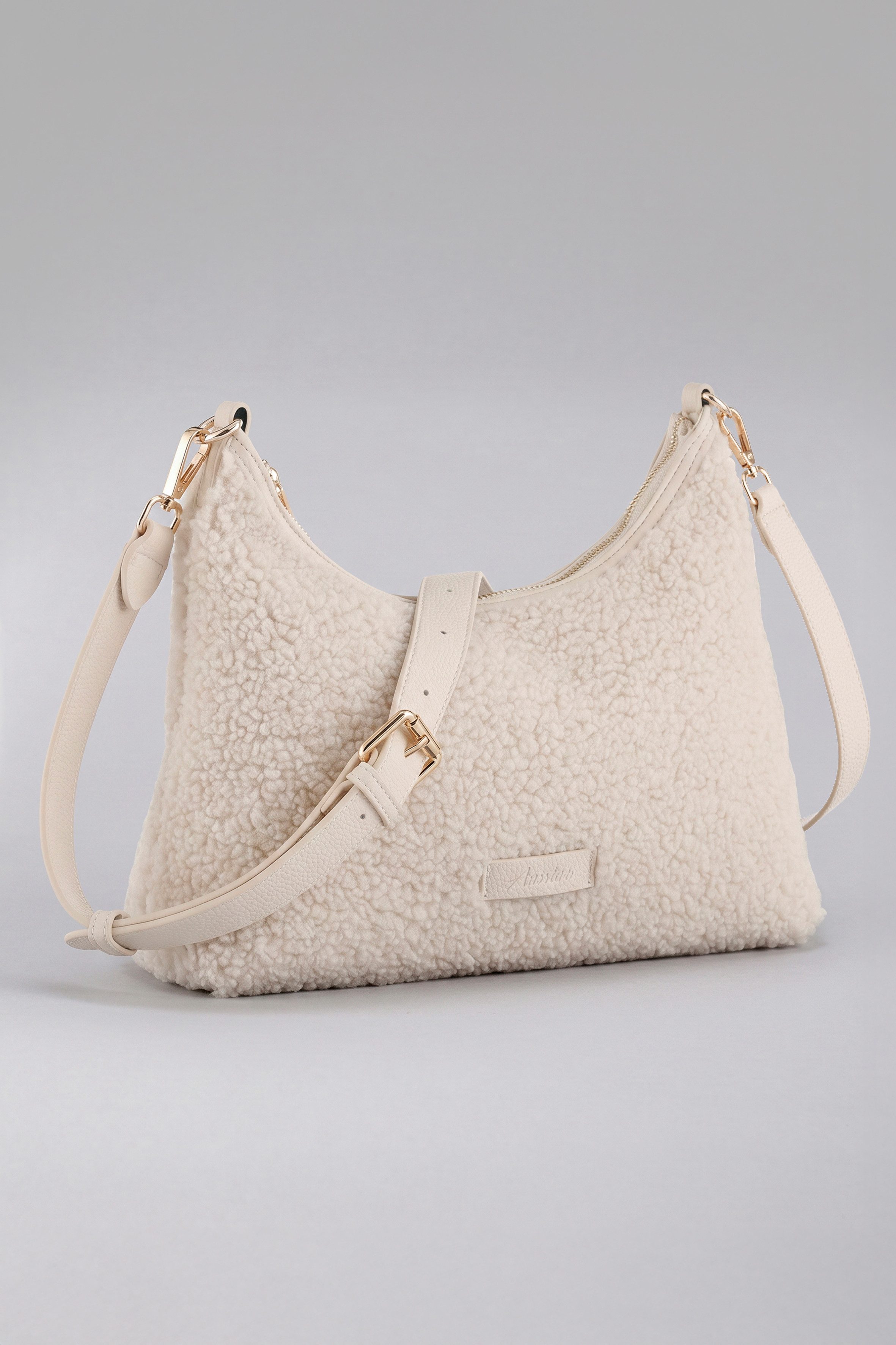 Aniston ACCESSOIRES Umhängetasche, Handtasche, Schultertasche in Teddy-Optik. € 39,99, (€ 39,99 pro 1 Stk).