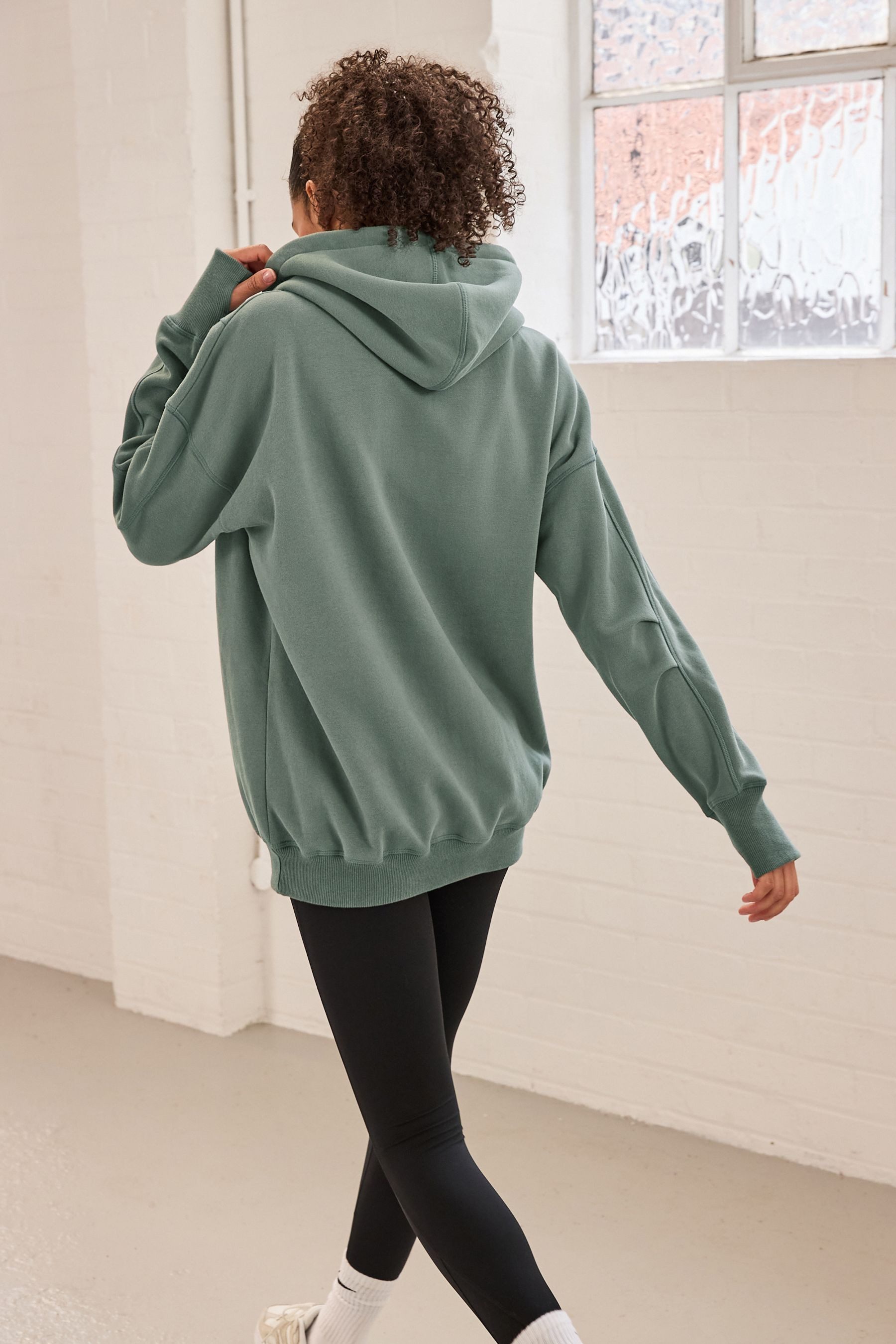 Next Kapuzenpullover Längeres Active Hoodie mit Taschen und Saumdetail (1-t günstig online kaufen