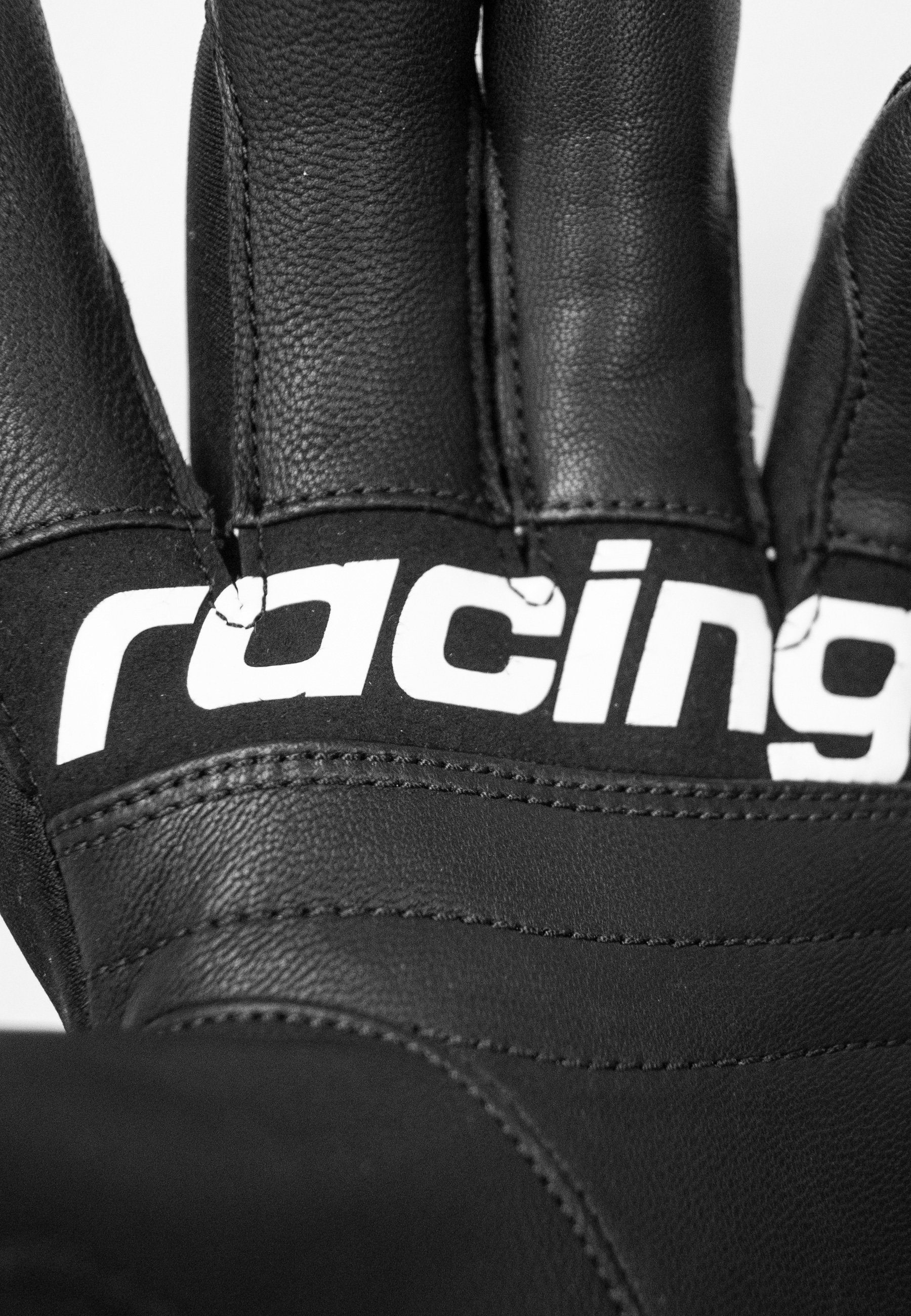 Reusch Skihandschuhe World Cup Warrior schwarz-weiß praktischer mit Neo Polsterung