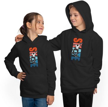 MyDesign24 Hoodie Kinder Kapuzensweater - Springender Skater vor buntem Skate Schriftzug Kapuzenpulli mit Aufdruck, i550