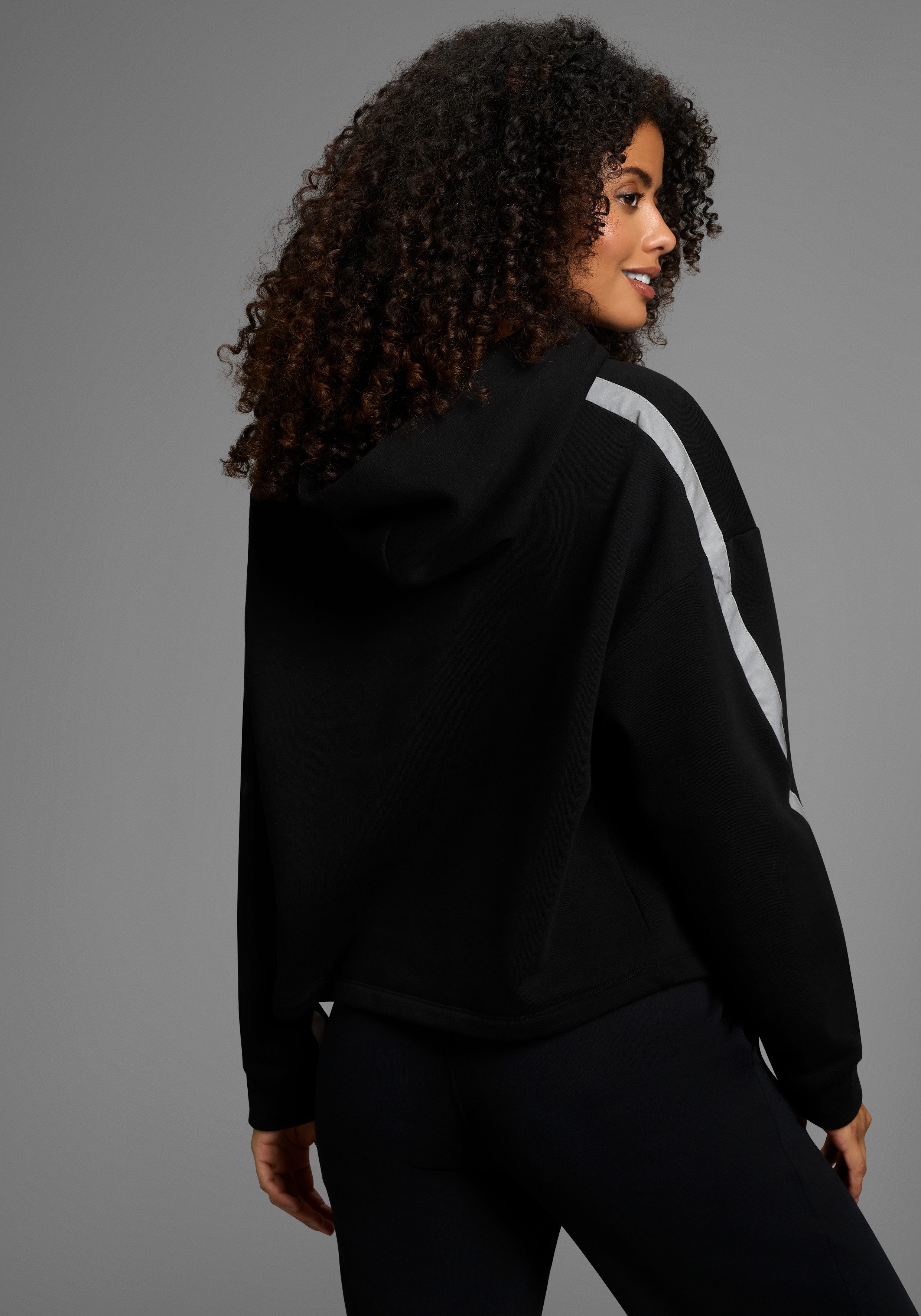 FAYN SPORTS Kapuzensweatshirt Weiches oversized Sweatshirt mit Reflektorstr günstig online kaufen