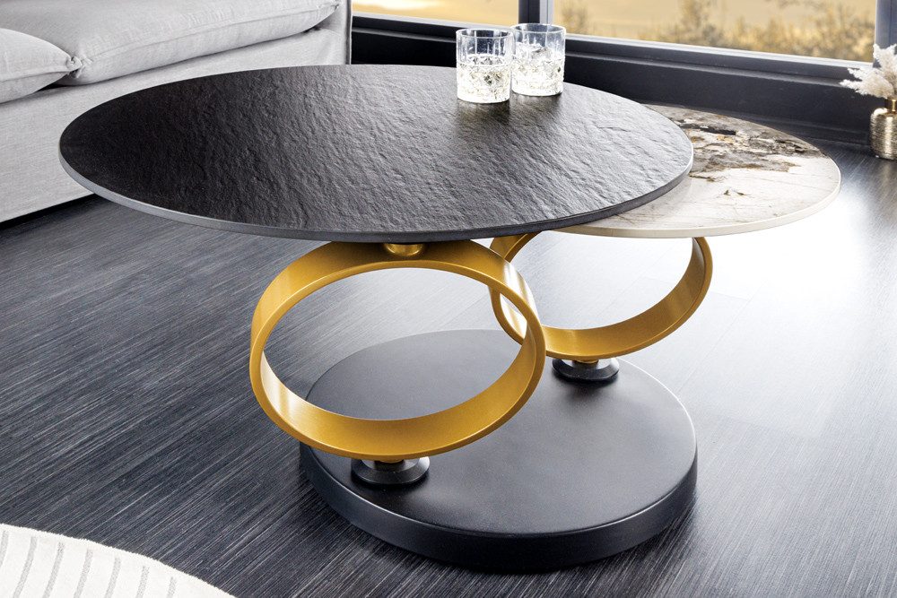 riess-ambiente Couchtisch DANCING RINGS 134cm schwarz (Einzelartikel, 1-St), Wohnzimmer · 2 Tischplatten · Naturstein-Design · Metall · drehbar