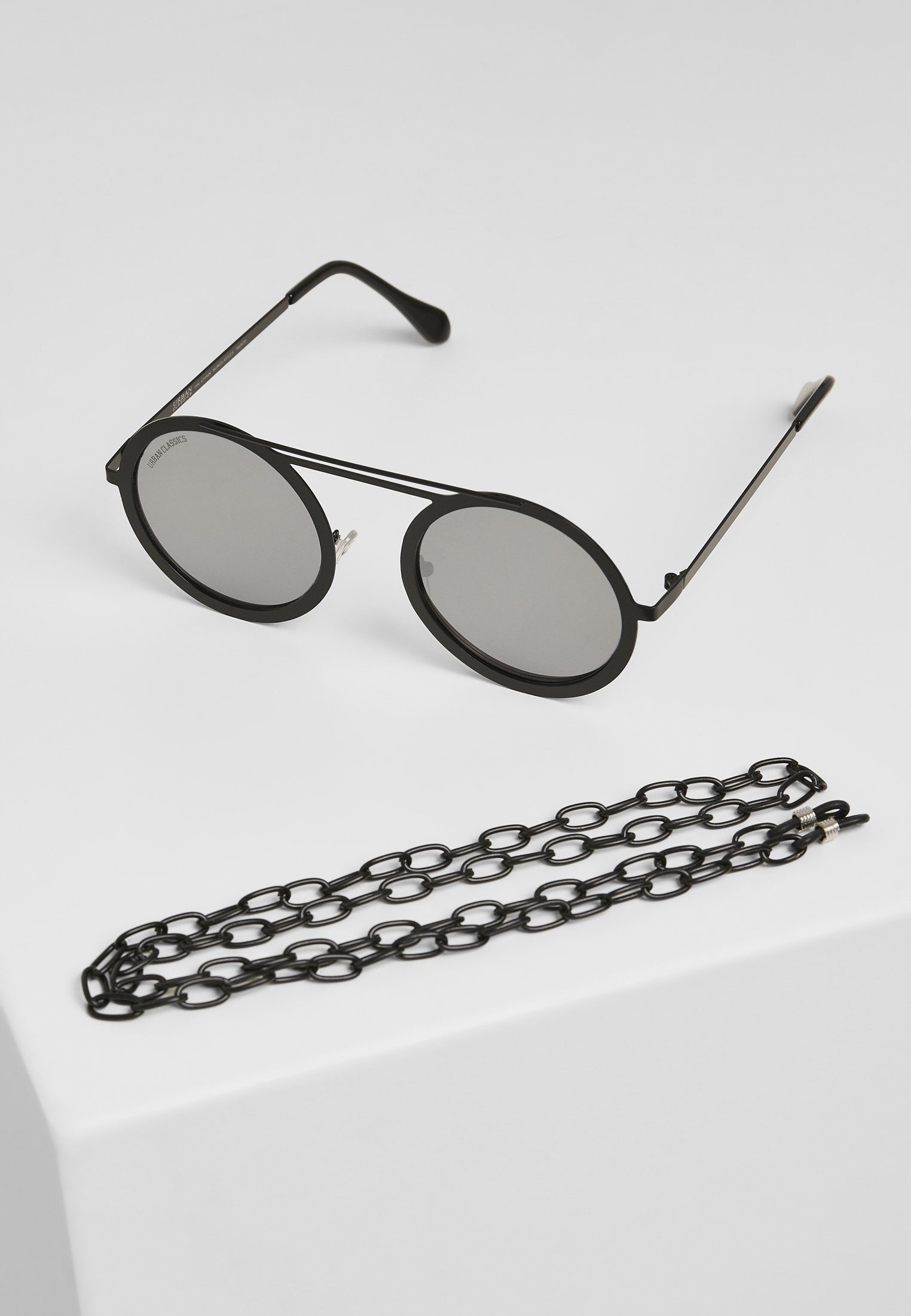 Super beliebt und 100 % Qualität garantiert! URBAN CLASSICS silver mirror/black Sonnenbrille Unisex Chain 104 Sunglasses