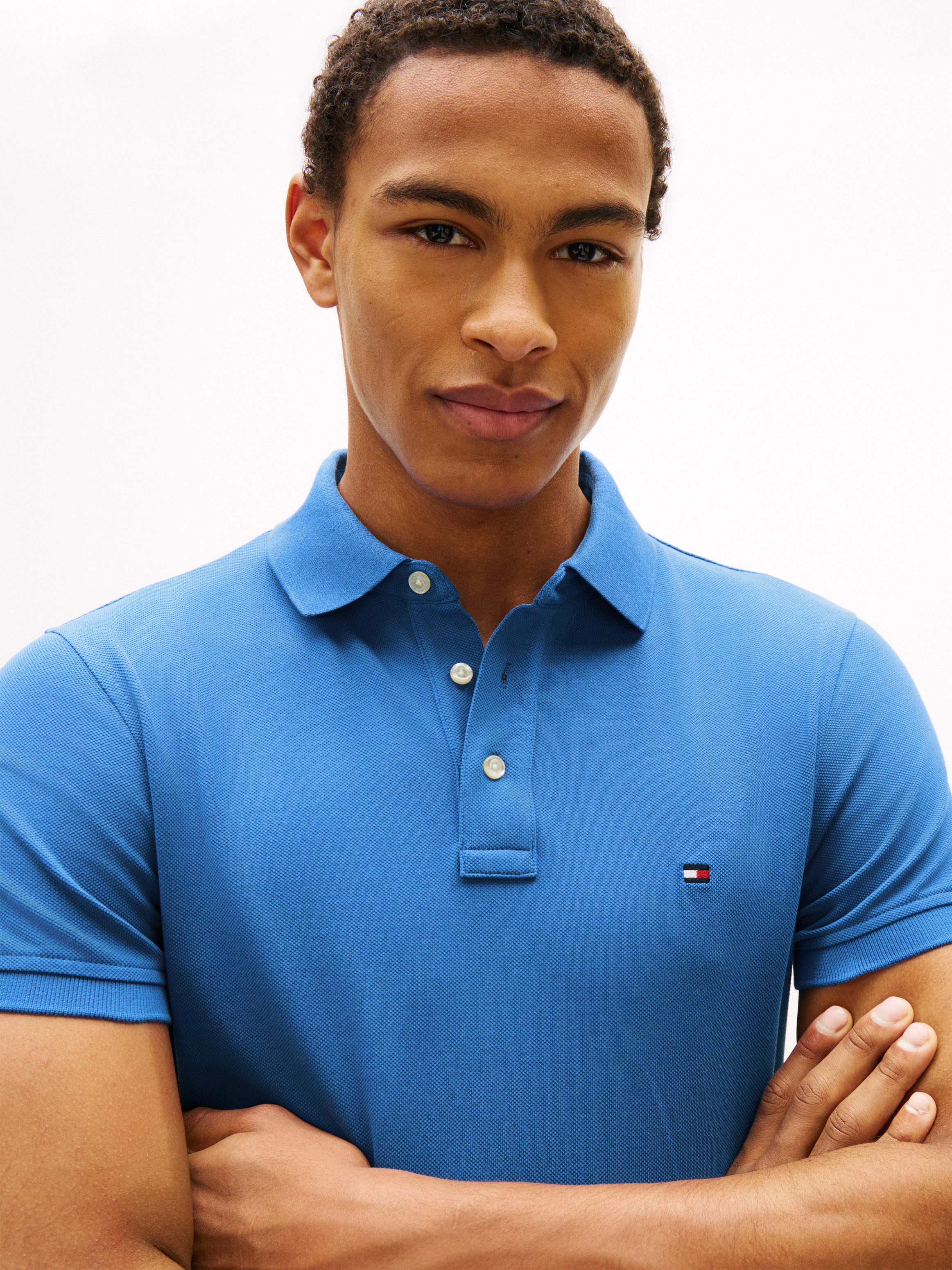 Tommy Hilfiger Poloshirt 1985 SLIM POLO Markenstickerei, aus Baumwoll-Piqué