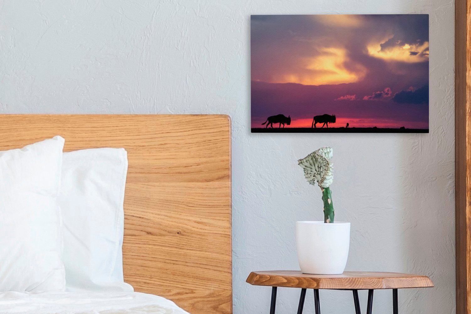 OneMillionCanvasses® Leinwandbild St), Sonnenuntergang mit (1 zwei Silhouetten cm Leinwandbilder, eines Aufhängefertig, Wandbild Wanddeko, 30x20 Gnus