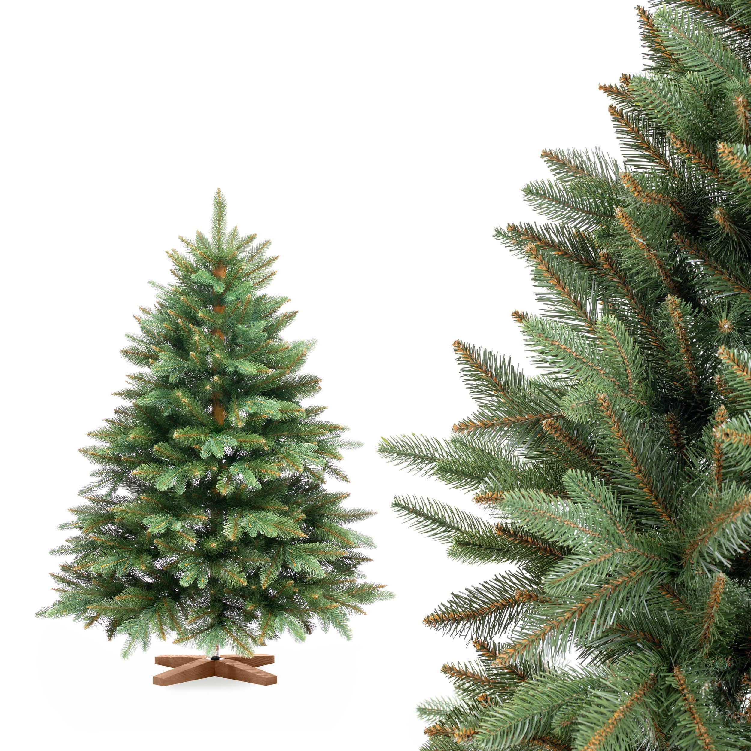 Fairytrees Künstlicher Weihnachtsbaum FT29, Nordmanntanne Premium, mit braunem Stamm und Echtholz Baumständer