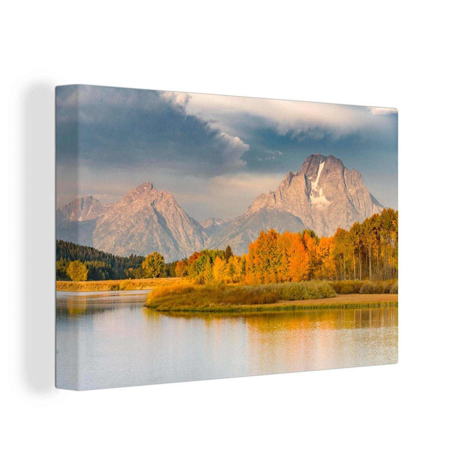 OneMillionCanvasses® Leinwandbild Die Teton Mountains Leinwandbilder, Waldlandschaft, Aufhängefertig, hinter unter dunklem cm Wandbild Wanddeko, (1 einer 30x20 Himmel St)