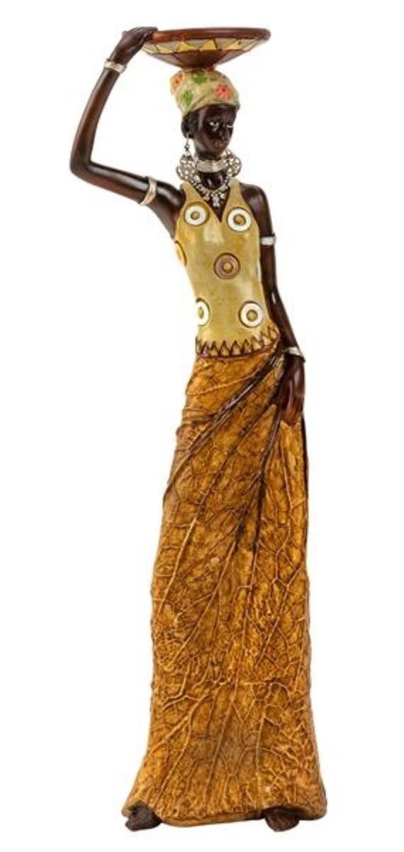 Geschenkestadl Afrikafigur Afrikanische Frau mit Schale, Rock in Blattoptik 35–40 cm Dekofigur (1tlg), Der Rock ist in Blattform gearbeitet