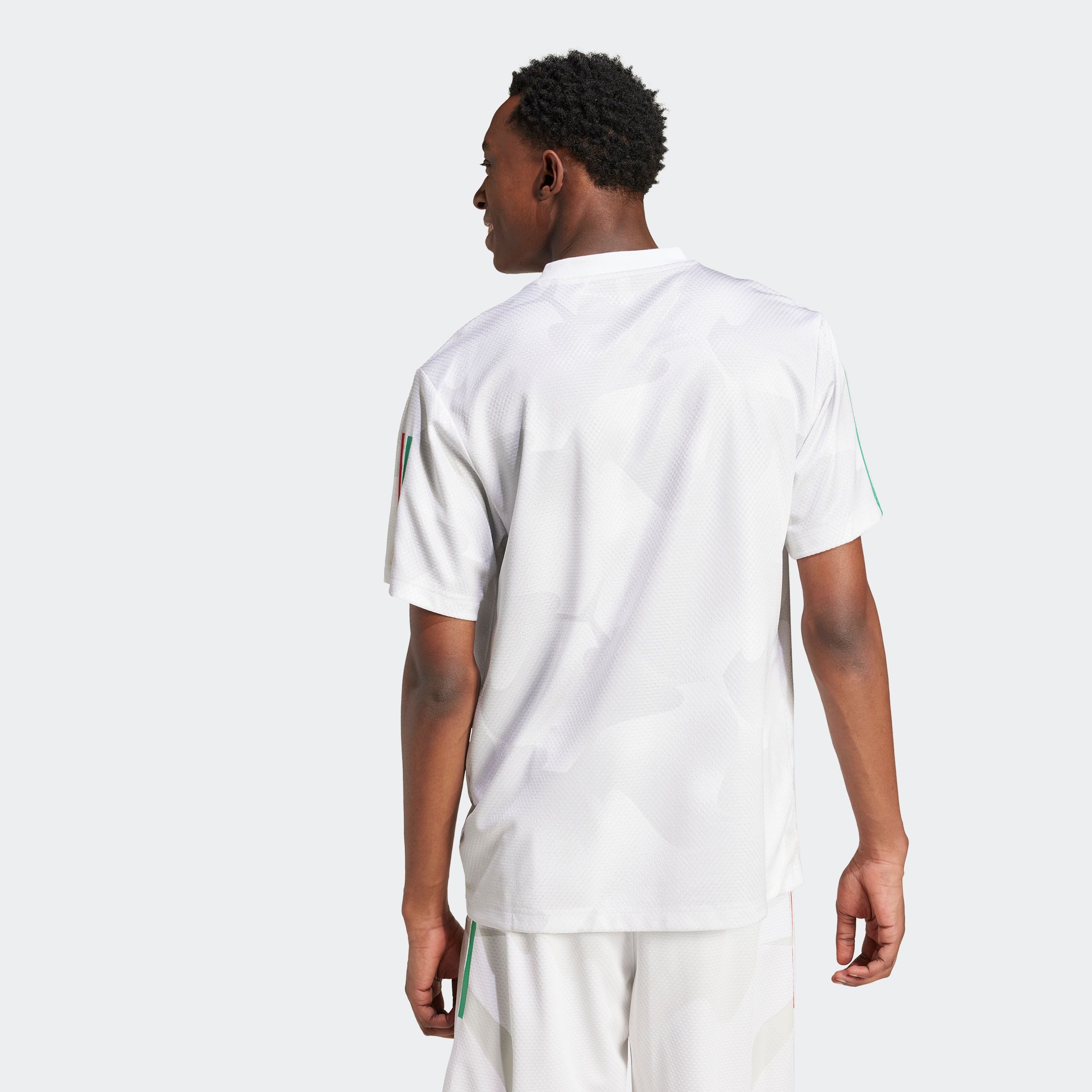 adidas Sportswear T-Shirt HOUSE OF TIRO NATIONS PACK sportlicher Schnitt, kurze Ärmel, mit Grafik und Allover-Print