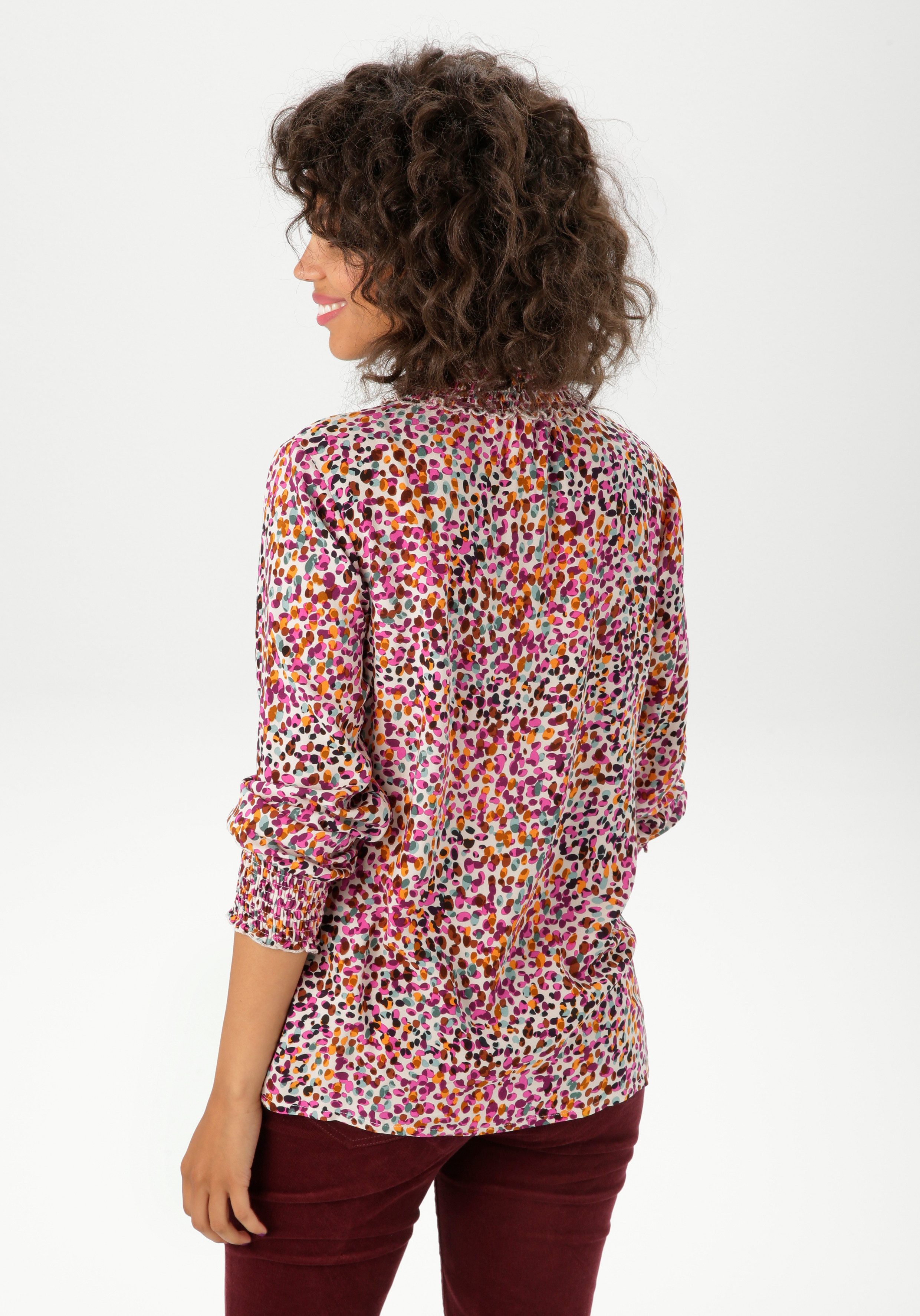 Aniston CASUAL Schlupfbluse mit farbharmonischen Tupfen bedruckt