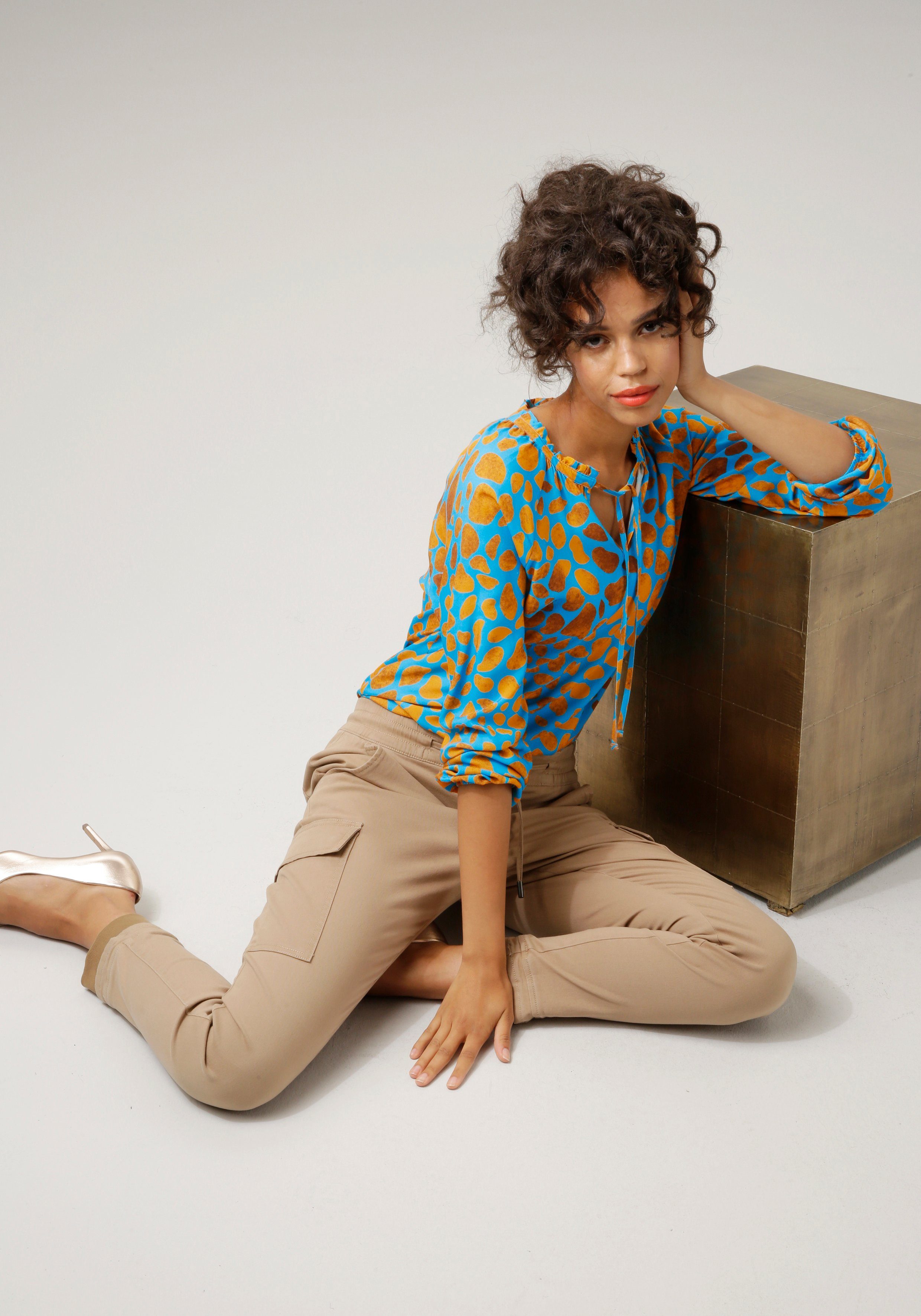 Aniston CASUAL slip blouse with interesting all-over print