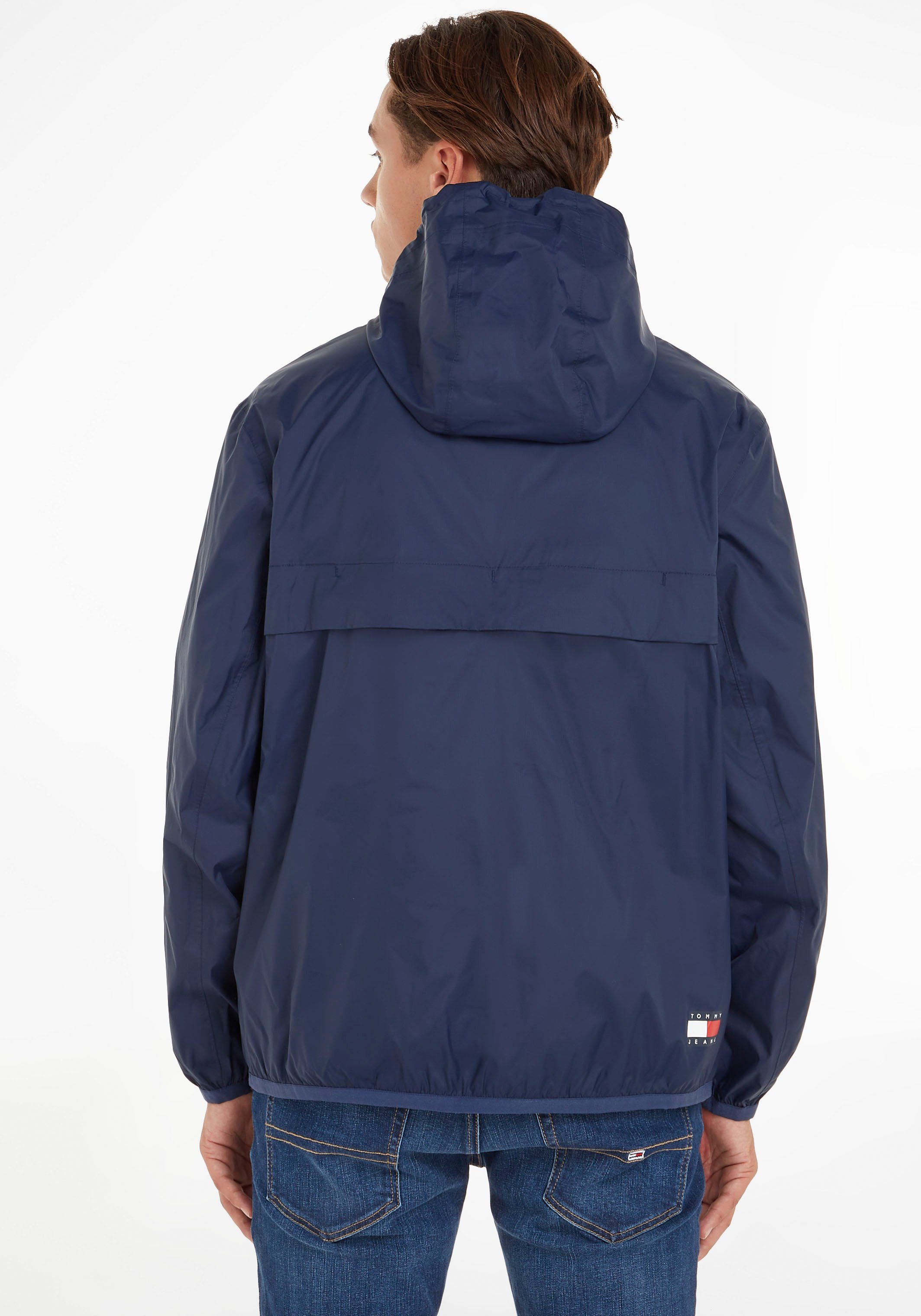 Tommy Jeans Windbreaker TJM PCKABLE TECH CHICAGO POPOVER mit kontrastfarben günstig online kaufen